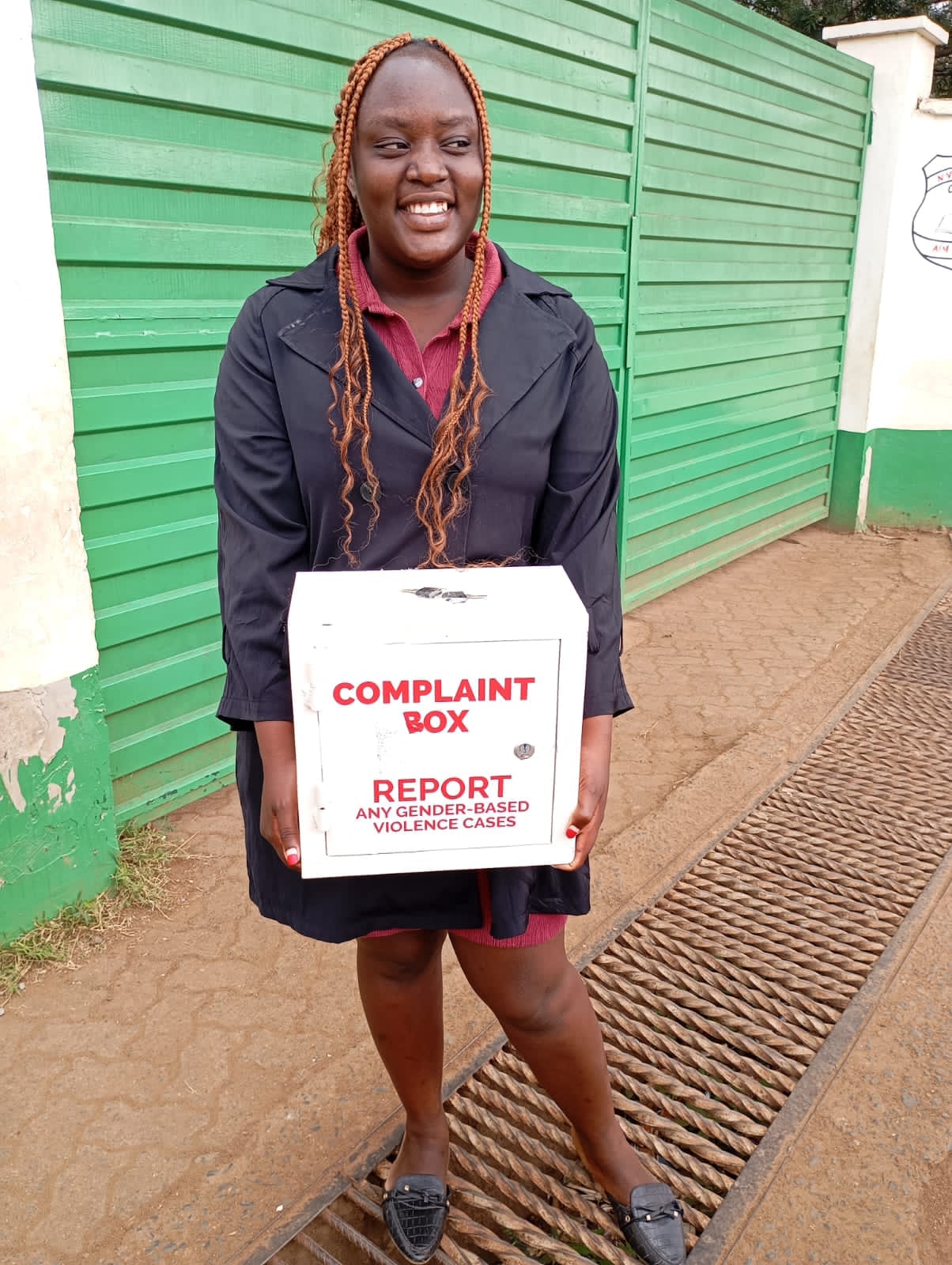 Great Ladies team providing complaint boxes to schools and communities